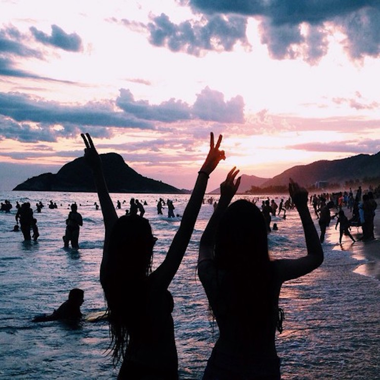 Girls at a sunset beach party